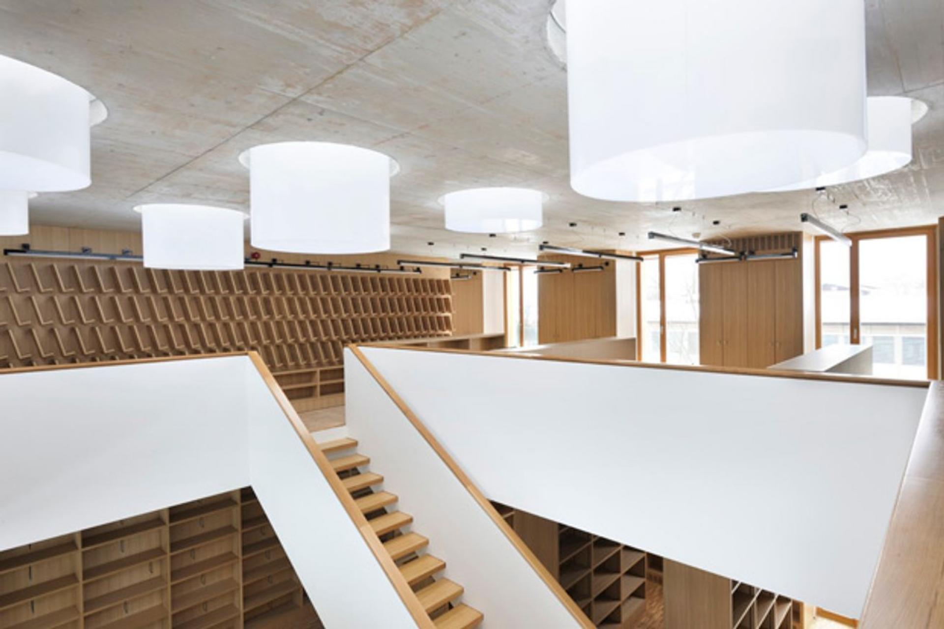 The library of the Biotechnical Faculty in Ljubljana by Kruse arhitekti is symbolically placed above the main entrance.