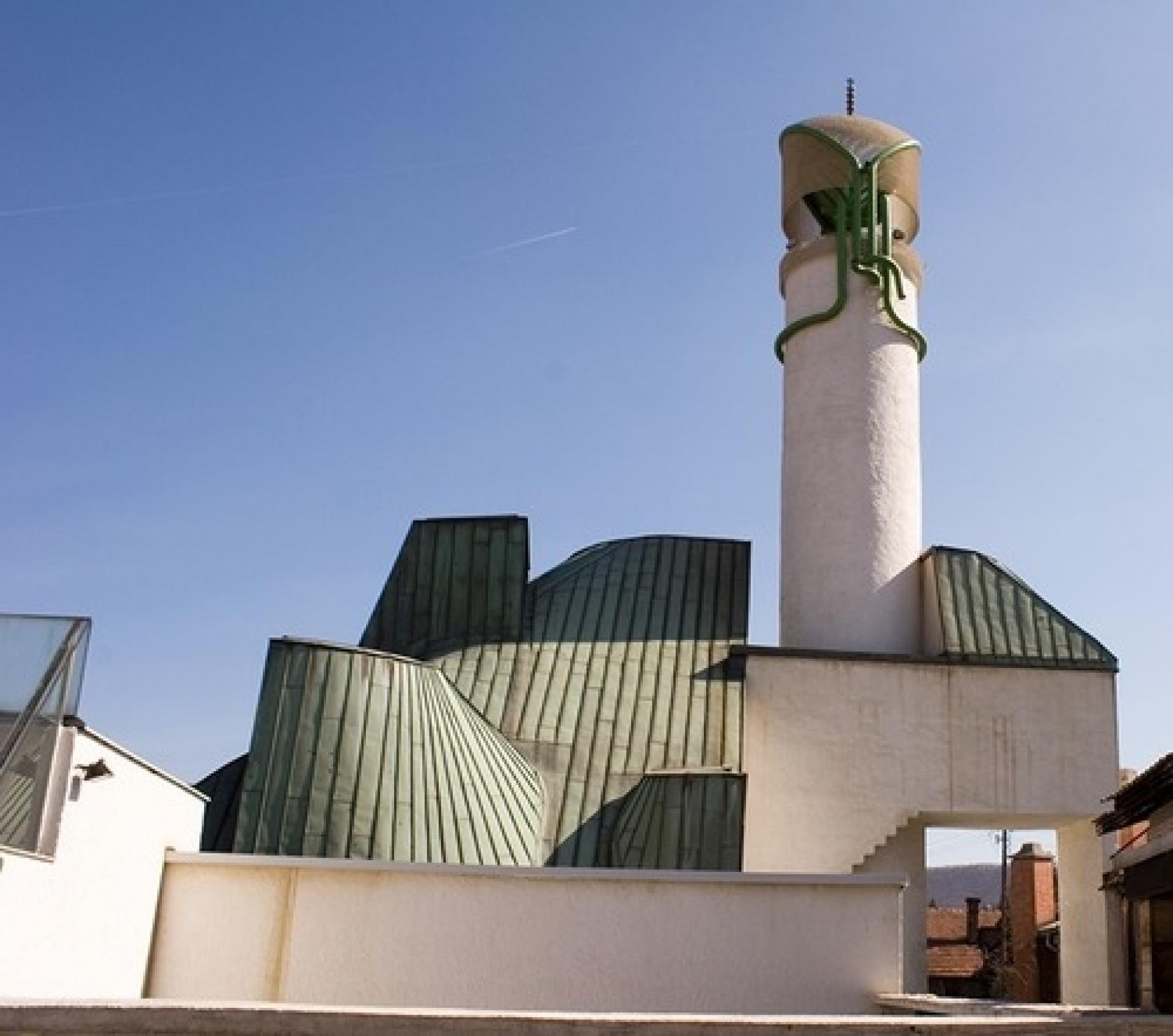 The principal symbolic elements of Šerafudin White Mosque by Zlatko Ugljen have a fresh folk art character. The Aga Khan Award for Architecture jury found it “full of originality and innovation (though with an undeniable debt to Ronchamp), laden with the architect’s thought and spirit, shared richly with the community, and connecting with the future and the past”.