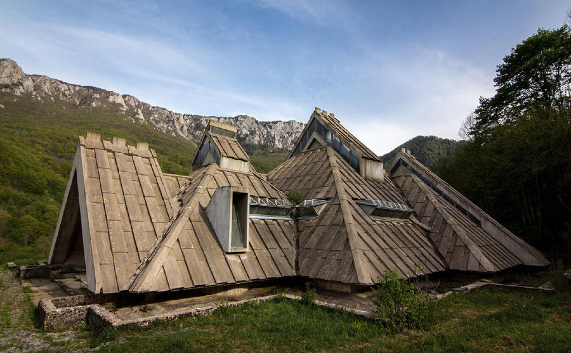 The memorial house at Tjentište in Bosnia and Herzegovina designed by Miodrag Živkovič and Ranko Radović in 1971. | Photo via The Bohemian Blog