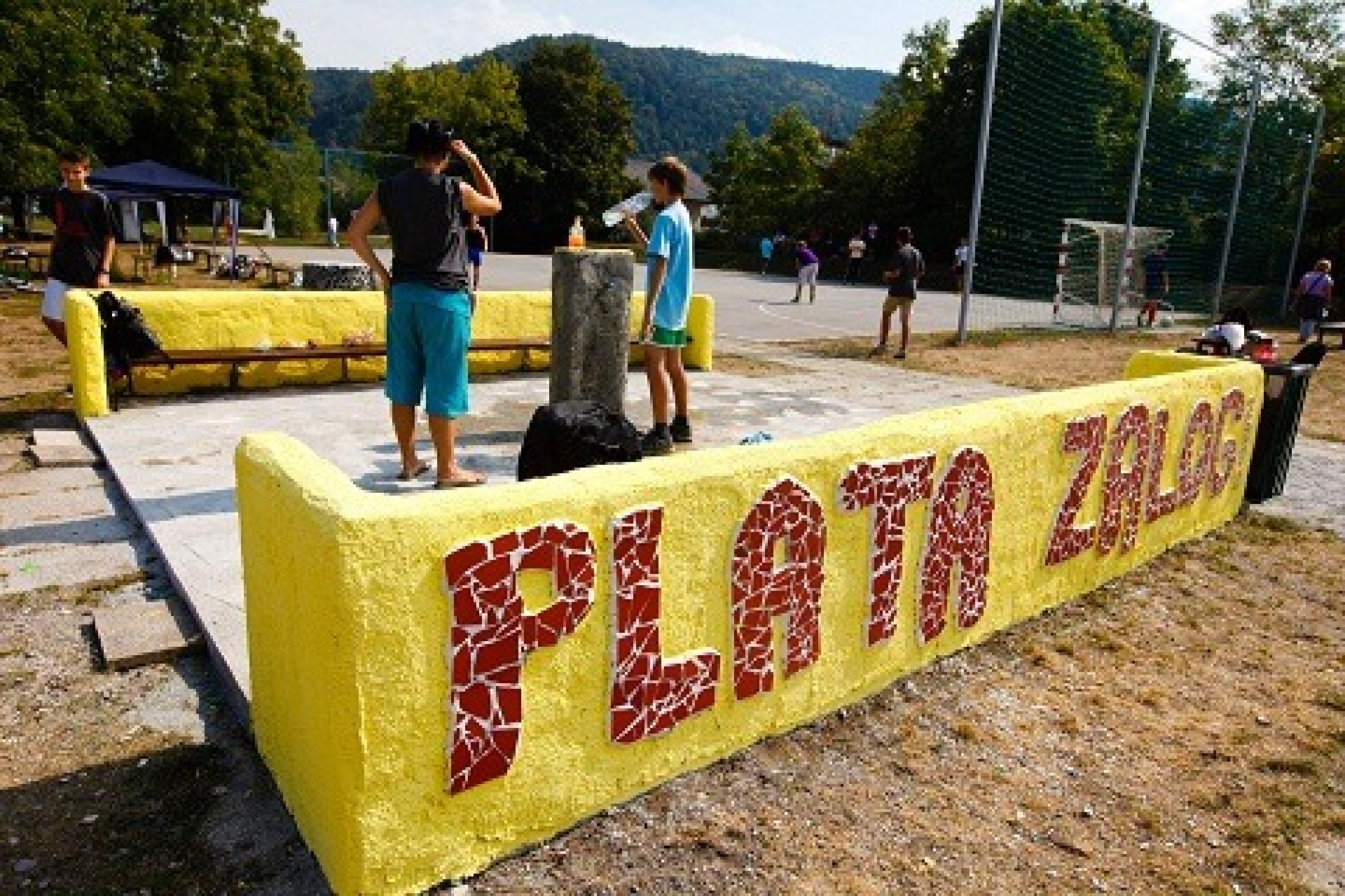 In Ljubljana suburb reusing materials and reconstructing of water well on football playground stimulates a larger sense of responsibility to the environment and inclusion of youngsters.