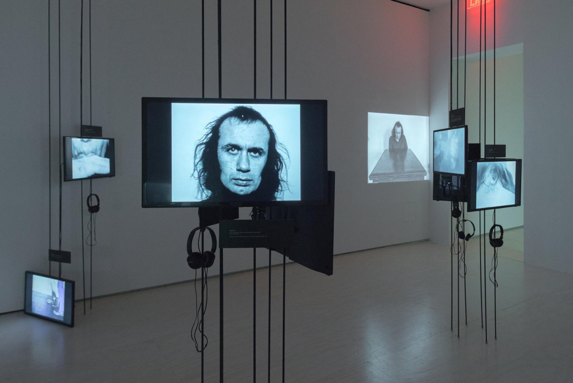 Acconci’s confessional pieces, a series of packed interiors. | Photo via NY Times