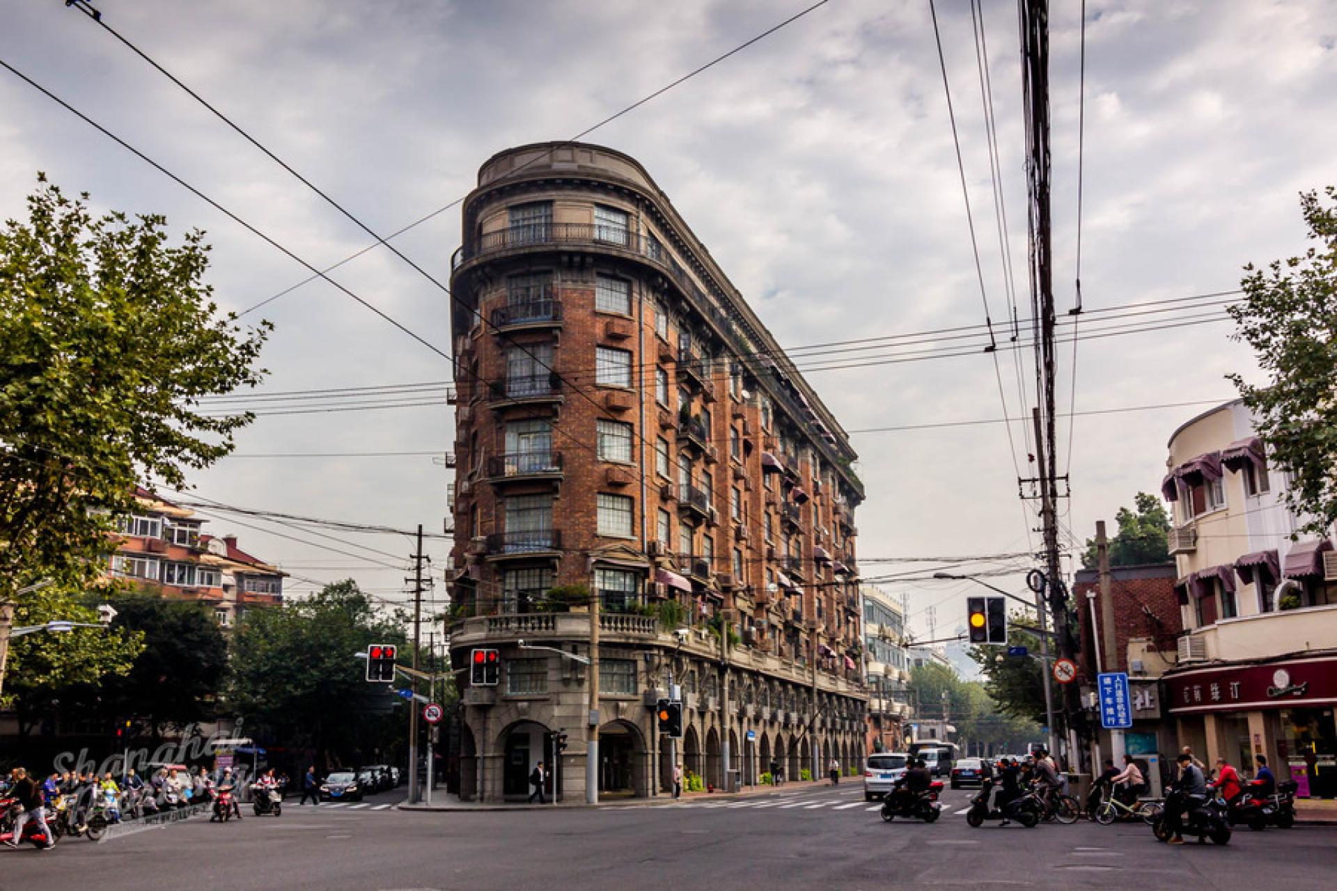 The eight-storey Wukang building was built to commemorate the Normandie, a World War I-era battleship, therefore looks like a ship. | Photo by Billi Qiu