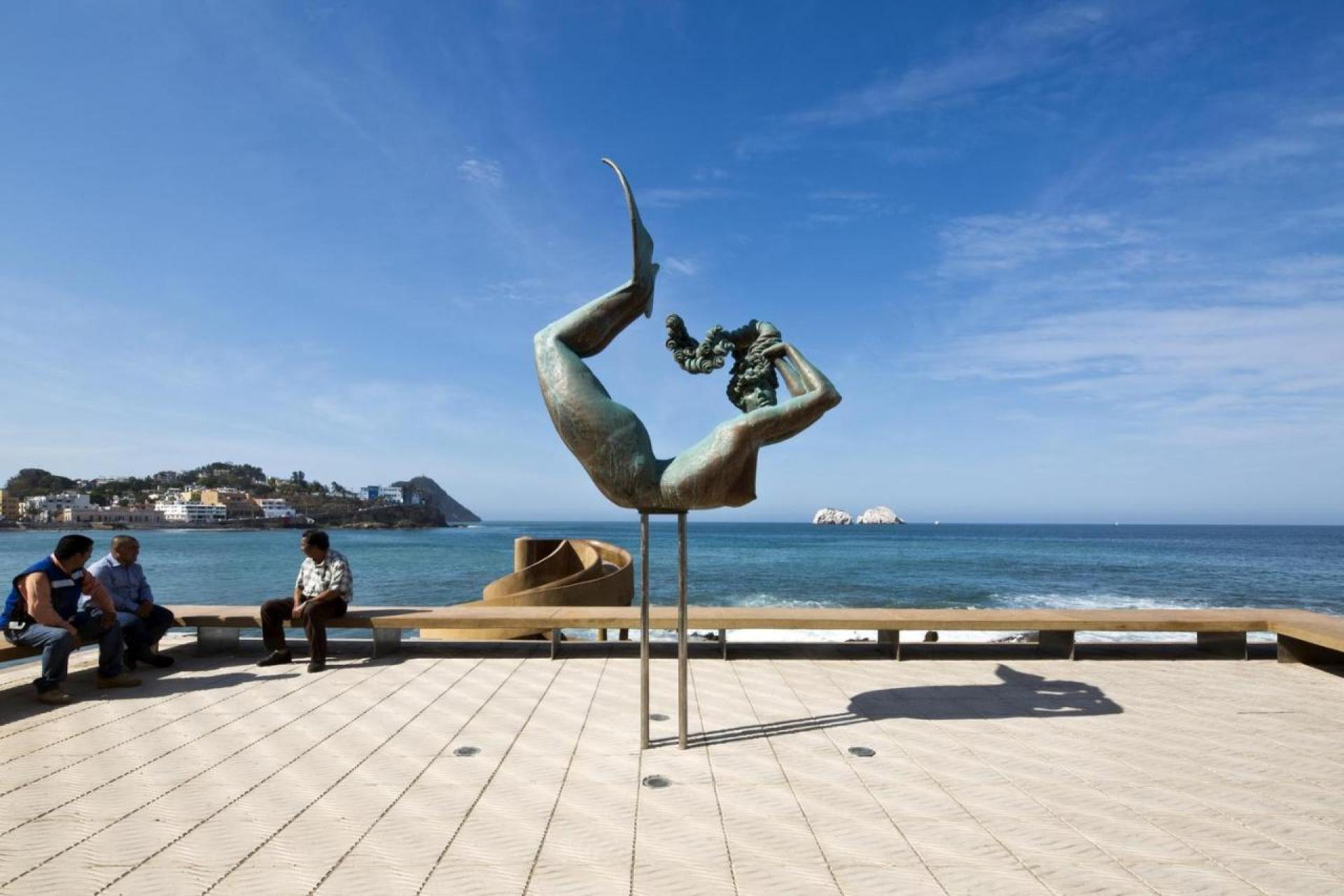 A new spiral slide creates a connection between the center and the sea with its sculptures geometry. | Photo by © Onnis Luque