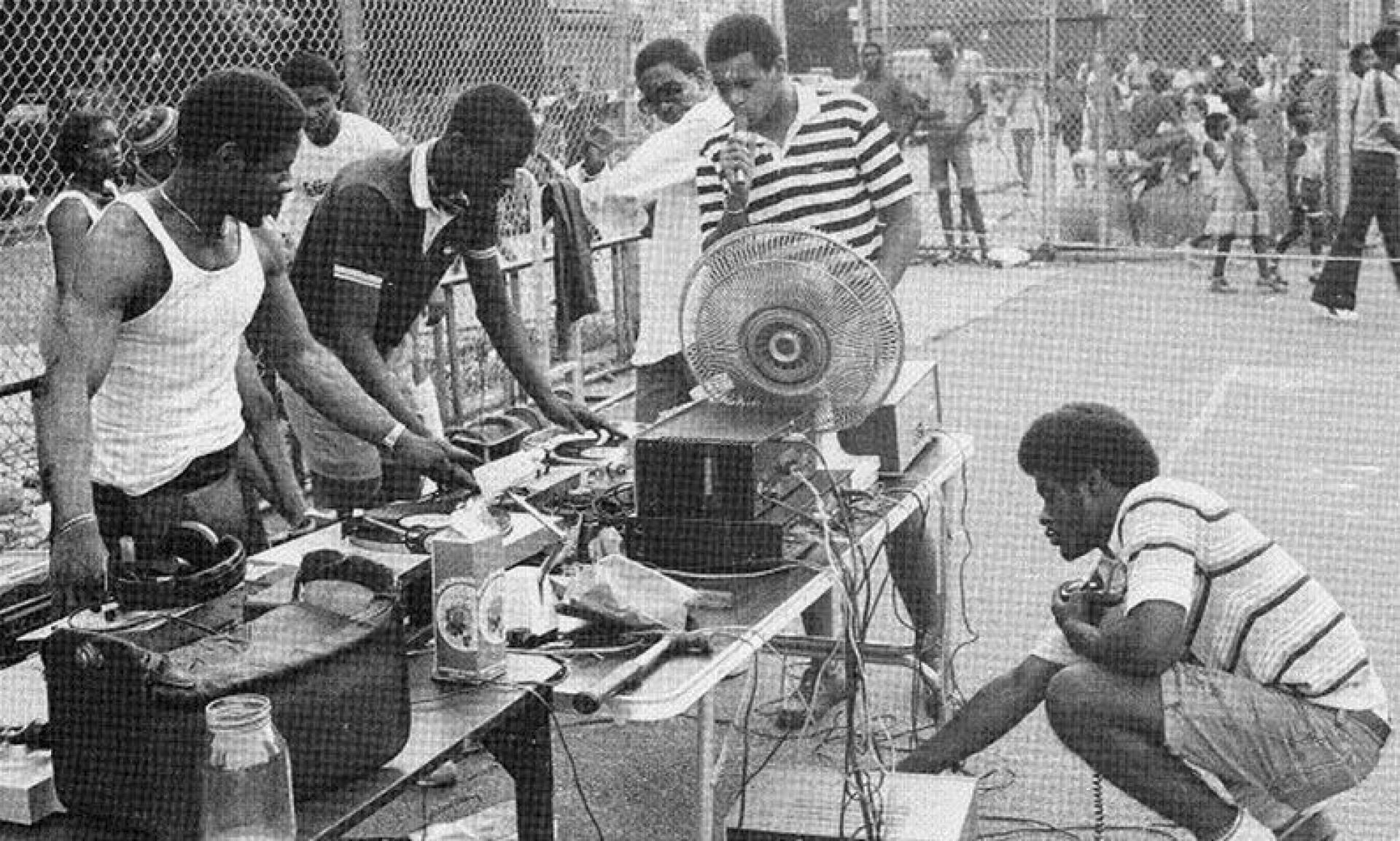 DJ Kool Herc sets up for the legendary block party at 1520 Sedgwick Avenue, Bronx, NY. 11th August 1973 | Source via Urban Ubiquity