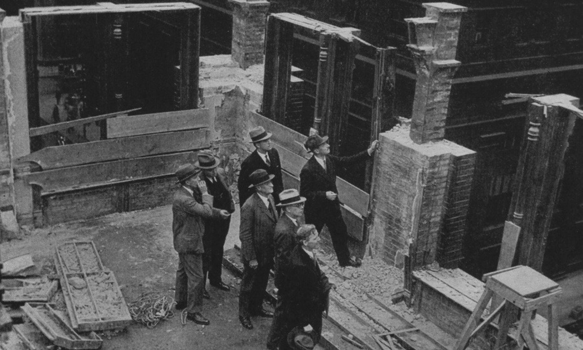 Architect Andrew Nicholas Rebori and colleagues examine the structure of the Home Insurance Building on its demolition in 1931. | Photo via by Chicagology