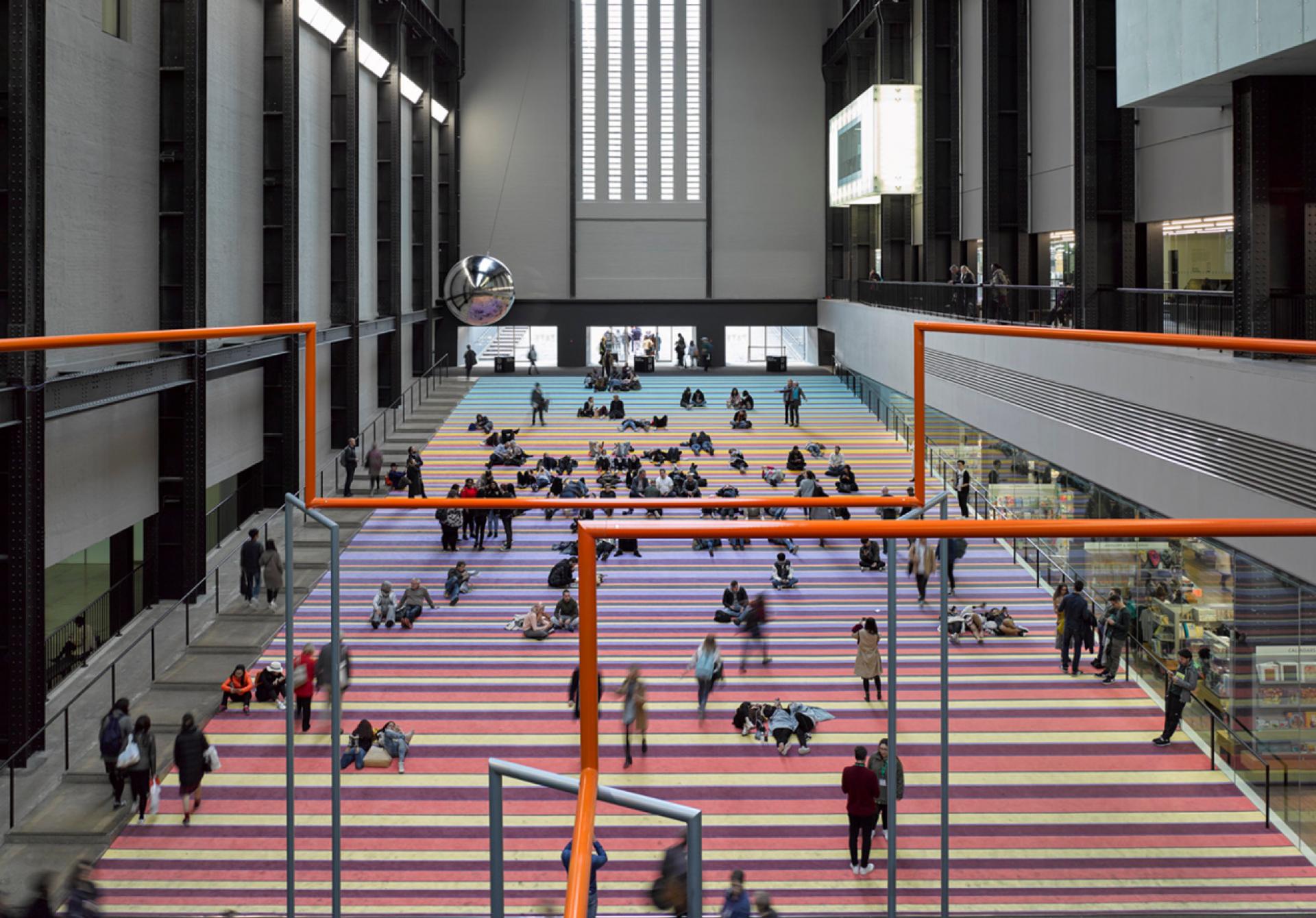 One of the numerous collaborations with SUPERFLEX, produced at Tate Modern in 2017; “One Two Three Swing! challenges society’s apathy towards the political, environmental and economic crises of our age”. The installation has since been presented in Bonn, Copenhagen, Dora, and AlUla. | Photo © James Morris