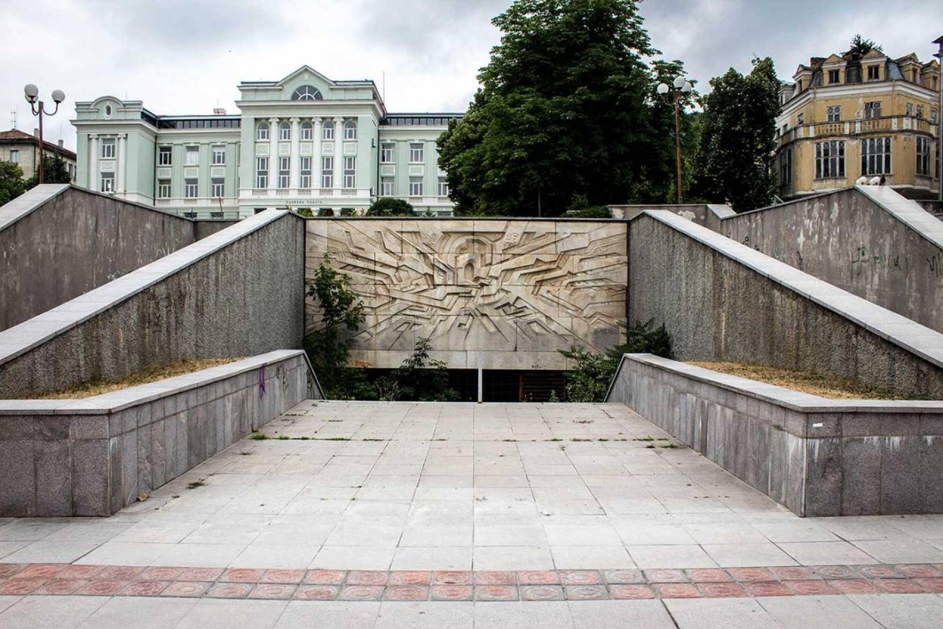 A modernist relief at the subterranean entrance. | Photo © Darmon Richter