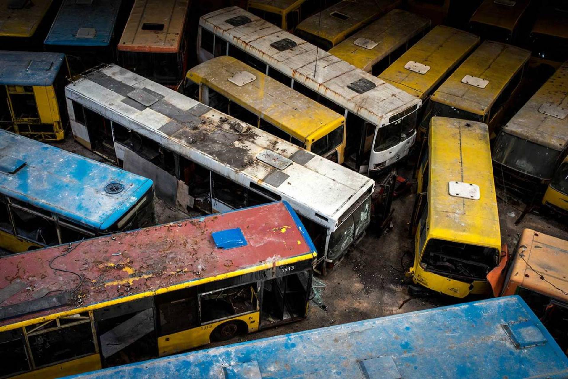 Since it was officially closed in 2015, almost 1,000 buses have been stored inside the abandoned building. | Photo © Darmon Richter