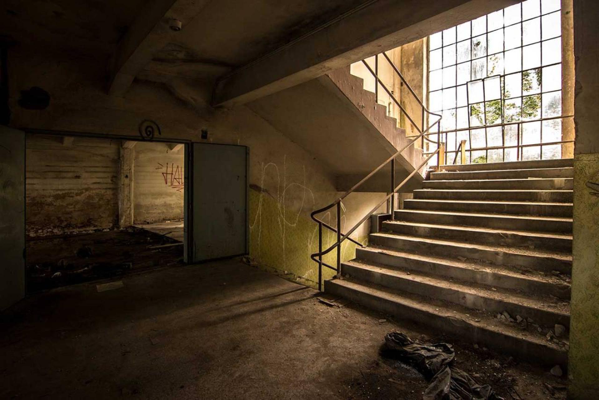 A staircase connects floors inside the main building. | Photo Katka Havlíková