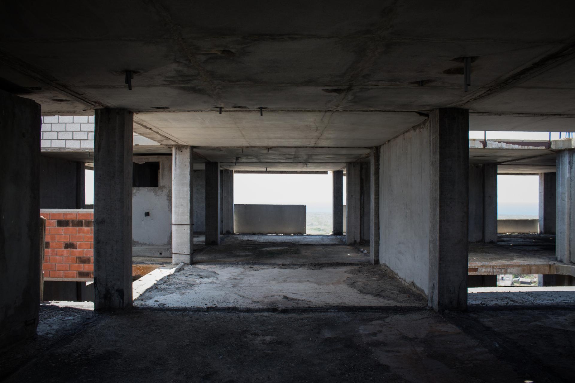 Empty spaces inside a tower block planned for luxury apartments.