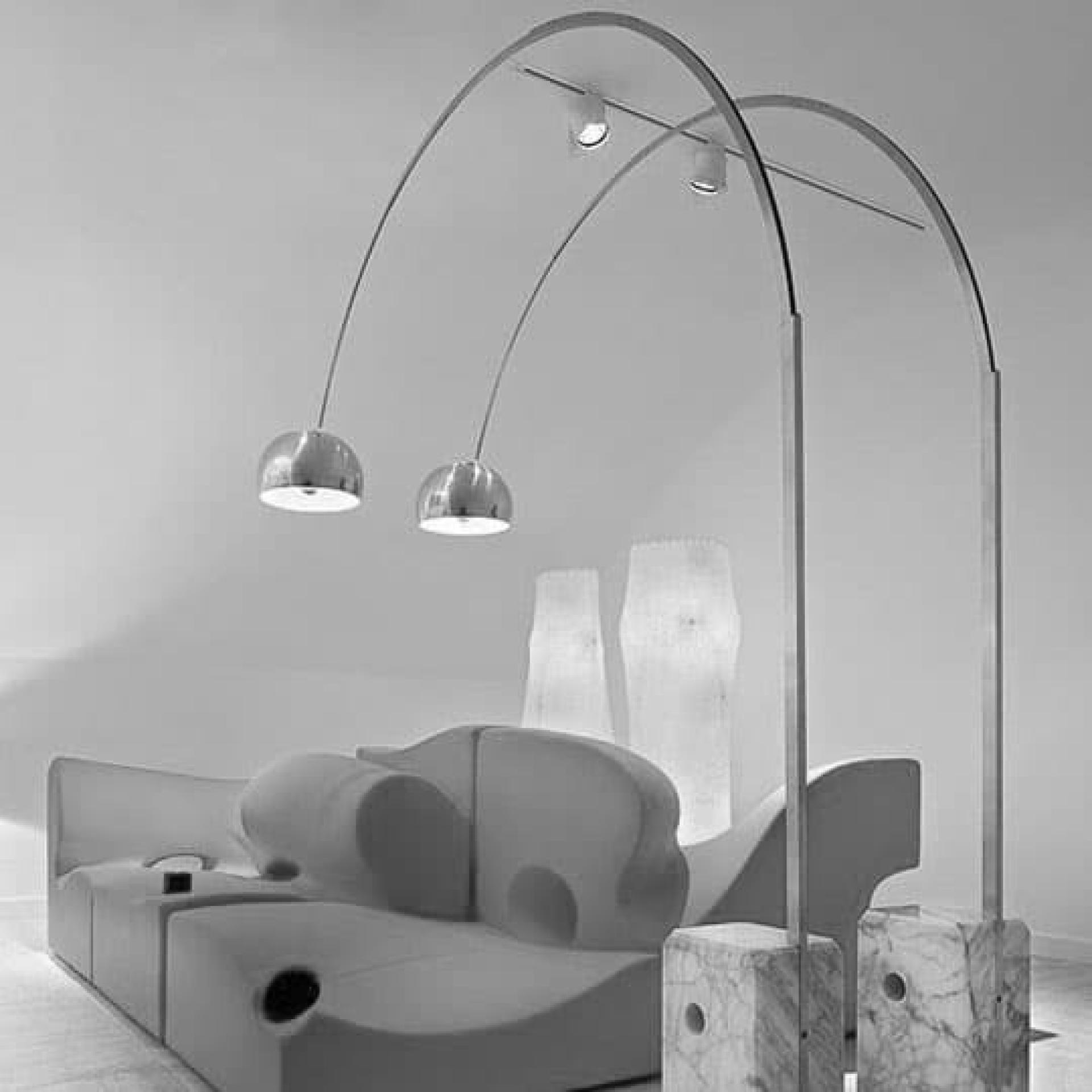 In 1962 the Arco floor lamp with a marble base designed by ”Achille & Pier Giacomo Castiglioni” was produced by the company Flos.