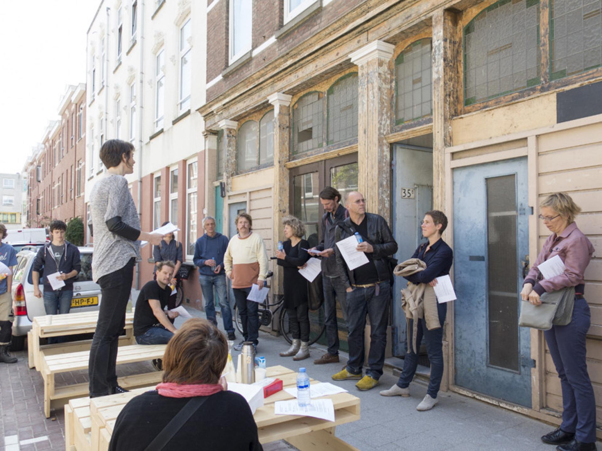 In front of two buildings at Pieter de Raadt Street in Rotterdam, from which City in the Making started (2015) | Photo © City in the Making